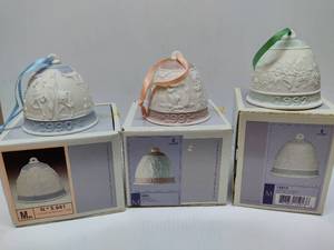 lot 11 image: LLADRO Set of Three Porcelain Bells