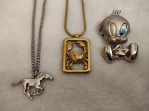 lot 116 image: Avon Stamped Necklaces & Tweety Watch Pendant