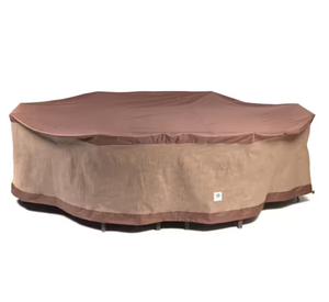 lot 119 image: Duck Covers Ultimate 96 in. L RectangleOval Patio Table and Chair Set Cover