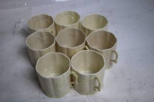 lot 261 image: Set of 8 Vintage Ceramic Mugs with Delicate Embossed Design