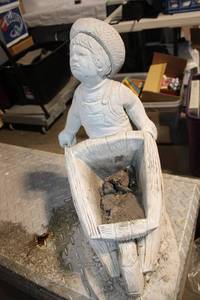 lot 265 image: Concrete Garden Statue of Boy with Wheelbarrow