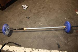 lot 10 image: Used 6ft Barbell with Blue Weight Plates
