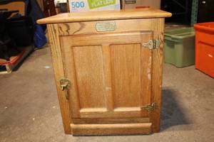lot 28 image: White Clad Wooden Icebox with Single Door