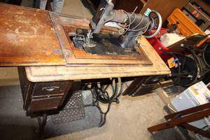 lot A-32 image: Antique Treadle Sewing Machine with Wooden Cabinet