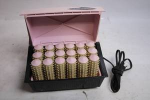 lot 56 image: Vintage Steamset Personal Hairdresser with 18 Hair Rollers