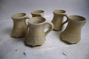 lot 71 image: Set of 5 Decorative Stoneware Mugs with Textured Design