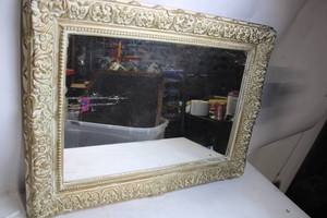 lot 77 image: Antique Ornate Wall Mirror with Detailed Frame (32 x 25)