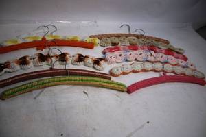 lot 82 image: Set of 10 Crochet-Covered Clothes Hangers