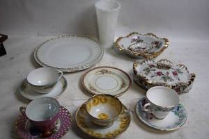 lot 103 image: Elegant Collection of Vintage Porcelain Teacups, Saucers, and Plates