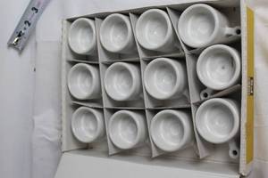 lot 140 image: Set of 12 IKEA White Porcelain Tealight Holders