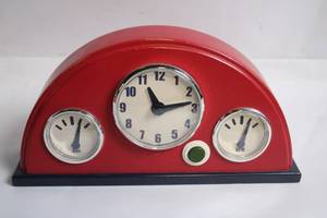 lot 7 image: Retro Red Desktop Clock with Gas and RPM Gauges Design