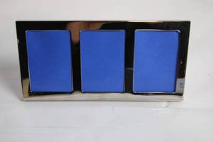 lot 57 image: Triple Opening Picture Frame with Blue Background
