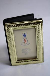 lot 62 image: Gold-Tone Studio Silverman Photo Album