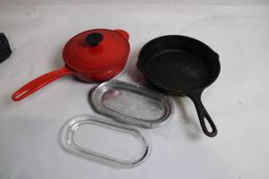 lot 64 image: Set of Cast Iron Skillet, Enamel Covered Pot, and Glass Cooking Trays