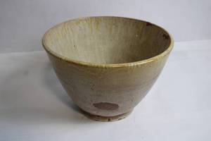 lot 65 image: Handcrafted Ceramic Bowl with Rustic Glaze Finish