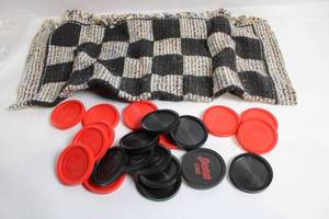lot 70 image: Set of Red and Black Checkers with Woven Game Board