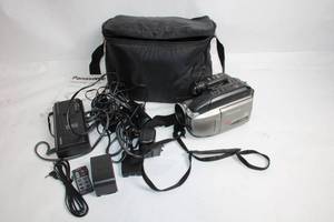 lot B-128 image: Panasonic Palmcorder PV-L678 VHS-C Camcorder with Accessories and Bag