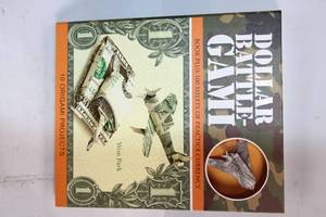 lot 158 image: Dollar Battle-Gami Book with 100 Sheets of Practice Currency