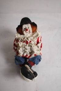 lot 196 image: Vintage Porcelain Clown Figurine with Red and Blue Outfit