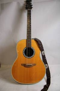 lot A-227 image: Matrix 113 Acoustic Guitar with Leather Strap