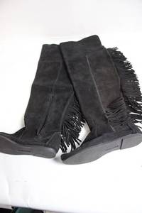 lot 234 image: Minnetonka Black Suede Fringe Knee-High Boots
