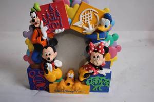 lot 4 image: Disney Character Photo Frame featuring Mickey, Minnie, Goofy, Pluto, and Donald