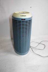 lot 33 image: Compact Electric Air Purifier with Corded Power