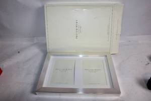 lot 83 image: Pottery Barn Lee Metal Double Photo Frame in 5x7 Size