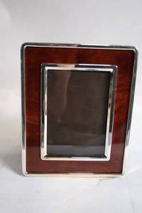 lot 85 image: Elegant Wood and Silver-Plated Picture Frame