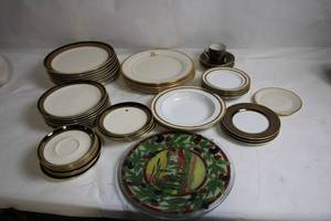lot 155 image: Set of Elegant Porcelain Dinnerware with Gold Trim and Decorative Plate