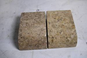 lot 202 image: Pair of Travertine Bookends with Natural Stone Finish
