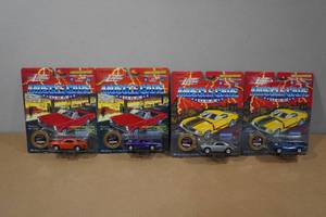 lot 7 image: 4 Johnny Lightning Die Cast Muscle Car Replicas - Super Bee