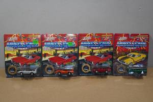 lot 10 image: 4 Johnny Lightning Die Cast Mucsle Car Replicas - Superbird