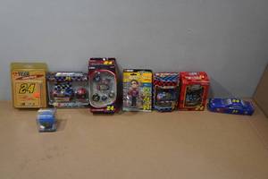 lot 19 image: Assorted NASCAR Collectibles - Coasters, Bobblehead, Pocket Knife