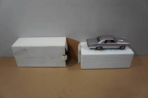 lot 32 image: Danbury Mint 1965 Pontiac GTO Die Cast Replica
