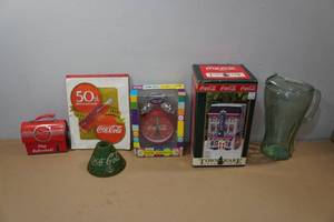 lot 41 image: Assorted Coca-Cola Collectibles - Alarm Clock, Lighted House ,Tin