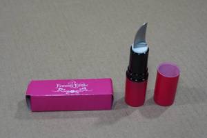 lot 105 image: Femme Fatale Lipstick Knife