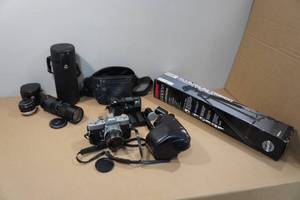 lot 115 image: Minolta SRT101 35mm SLR Camera with Lenses and Accessories