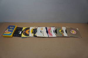 lot 257 image: Assorted 45 RPM Vinyl Records and the Beatles VHS