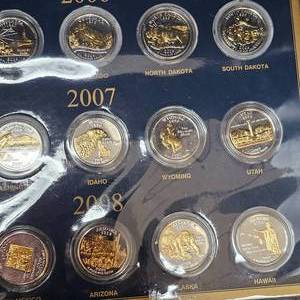 lot 33 image: Fifty United States 24kt Gilded Quarter Dollar Collection