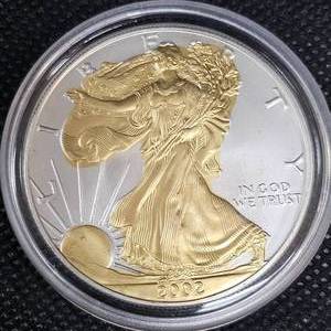 lot 51 image: 2002 Silver Eagle, Gold Guilded