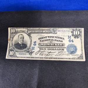 lot 65 image: 1902 $10 Milwaukee Large Note Error, Cut Offset, Top to Bottom Very Nice