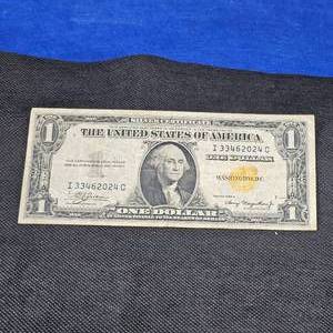 lot 128 image: 1935 A $1 North Africa Gold Seal WW II Note