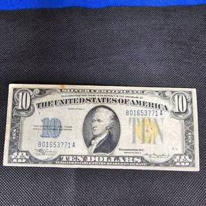 lot 130 image: 1934 A $10 N Africa Gold Seal WW II Note