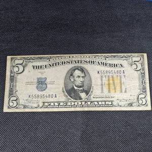 lot 131 image: 1934 A $5 North Africa Gold seal WW II Note