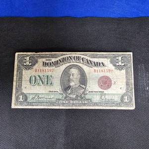 lot 132 image: 1923 $1 Canadian Red Seal Large Note