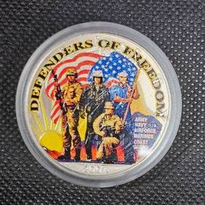 lot 136 image: 2001 Colored Defenders of Freedom 1 oz Silver Round