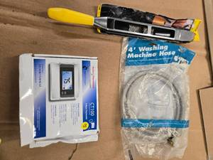 lot 48 image: Lot of three items Radio Thermostat , a 4ft Washing Machine Hose, and Grill Equipment (NEW)
