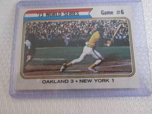 lot 57 image: 1974 Topps Reggie Jackson World Ser...