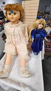 lot 31 image: Collectors Choice Porcelain Doll and 24 Baby Doll